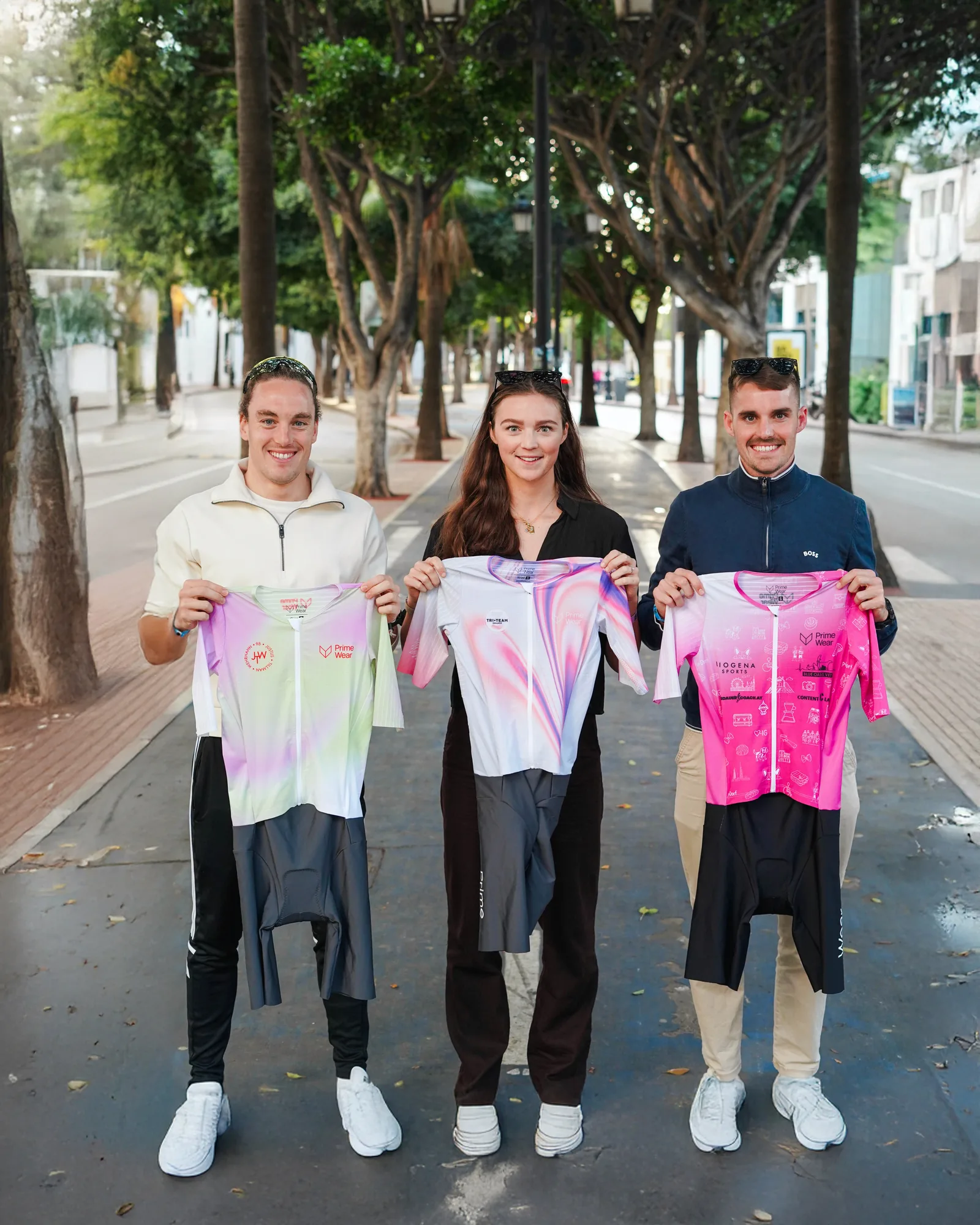 Three athletes with their custom kits